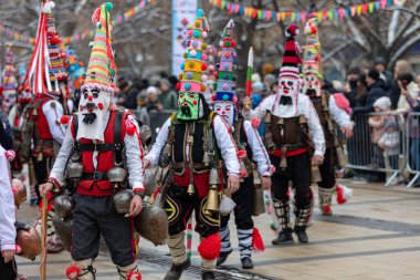 Pernik, Bulgaria - January 28, 2023: Masquerade festival in Pernik Bulgaria. People with a mask called Kukeri dance and perform to scare the evil spirits. The photo was taken on January 28th, 2023