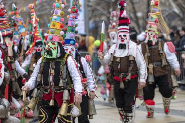 Pernik, Bulgaria - January 28, 2023: Masquerade festival in Pernik Bulgaria. People with a mask called Kukeri dance and perform to scare the evil spirits. The photo was taken on January 28th, 2023