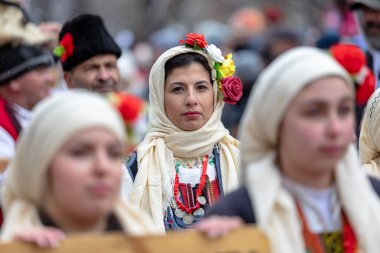 Pernik, Bulgaria - January 28, 2023: Masquerade festival in Pernik Bulgaria. People with a mask called Kukeri dance and perform to scare the evil spirits. The photo was taken on January 28th, 2023
