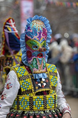 Pernik, Bulgaria - January 28, 2023: Masquerade festival in Pernik Bulgaria. People with a mask called Kukeri dance and perform to scare the evil spirits. The photo was taken on January 28th, 2023