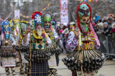 Pernik, Bulgaria - January 28, 2023: Masquerade festival in Pernik Bulgaria. People with a mask called Kukeri dance and perform to scare the evil spirits. The photo was taken on January 28th, 2023
