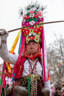 Pernik, Bulgaria - January 28, 2023: Masquerade festival in Pernik Bulgaria. People with a mask called Kukeri dance and perform to scare the evil spirits. The photo was taken on January 28th, 2023