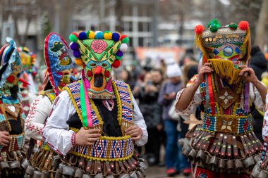 Pernik, Bulgaria - January 28, 2023: Masquerade festival in Pernik Bulgaria. People with a mask called Kukeri dance and perform to scare the evil spirits. The photo was taken on January 28th, 2023