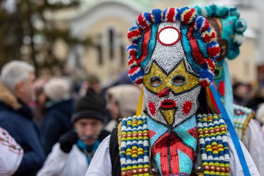 Pernik, Bulgaria - January 28, 2023: Masquerade festival in Pernik Bulgaria. People with a mask called Kukeri dance and perform to scare the evil spirits. The photo was taken on January 28th, 2023