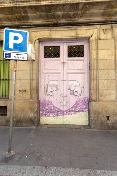 stock image Barcelona, Spain - June 22, 2023: Walking with a camera on the beautiful streets of Barcelona. Door of an old building