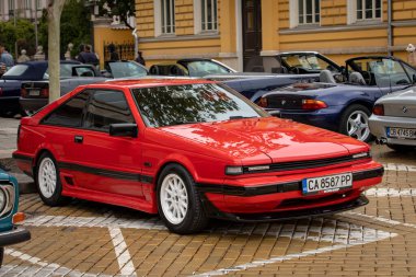 Sofya, Bulgaristan - 15 Eylül 2024: Bulgaristan 'ın başkenti Sofya' daki Autumn Retro Parade 'de eski model otomobil geçidi, Nissan Silvia S12 200SX