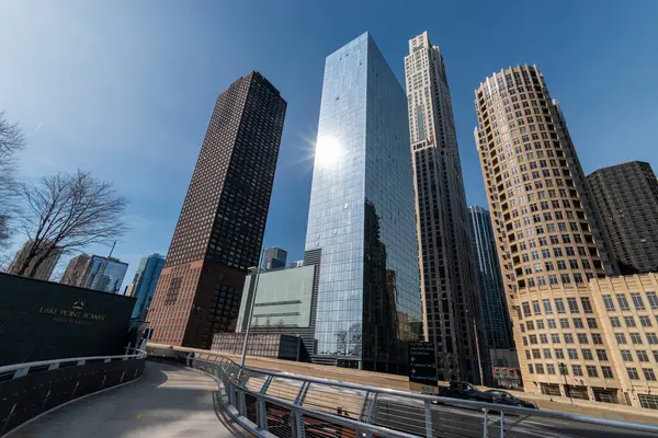 stock image Chicago, IL, USA - March 2019: Urban Perspectives, Bike and Car Overpass Between Lakefront Trail, DuSable Lake Shore Drive, and E Grand Ave, Overlooking Chicago Towers.
