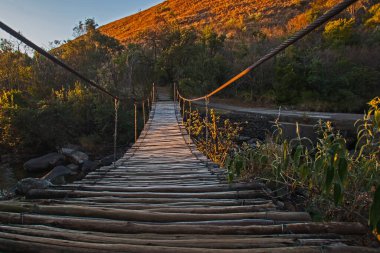 Early morning frosted suspension bridge in the Drakensberg South Africa clipart