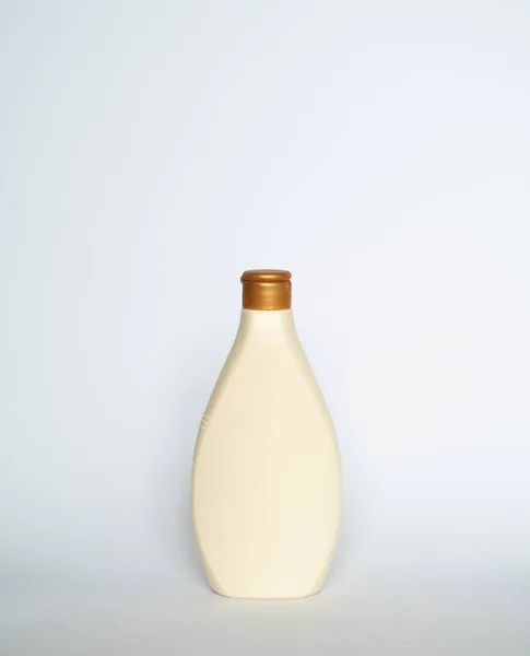 Beige Blank Plastic Bottles Isolated White Background — Stockfoto