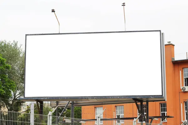 Blank billboard sign mockup in the urban environment, empty space to display advertising campaign mock up template.