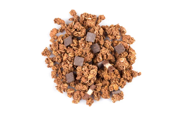 Macro close up of chocolate muesli with pieces of chocolate