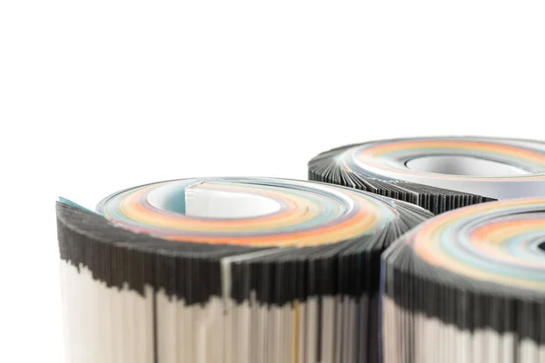 stock image Colorful magazines close up photo - rolled up composition