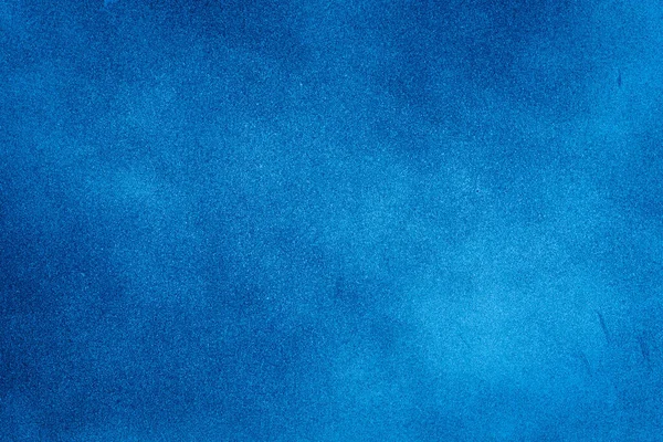 明るいセンター スポット ライトの青いテクスチャ背景 — ストック写真