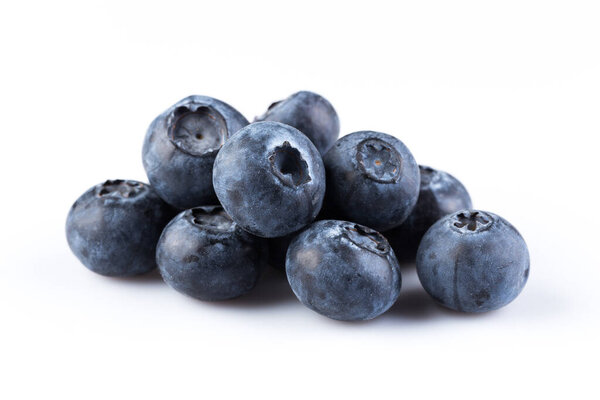 Group of fresh juicy blueberries isolated on white background
