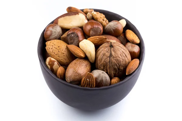 Large Diversity Healthy Nuts Dark Stone Bowl Isolated — Stock Photo, Image