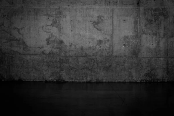 stock image Grungy dark concrete wall and wet floor for background texture