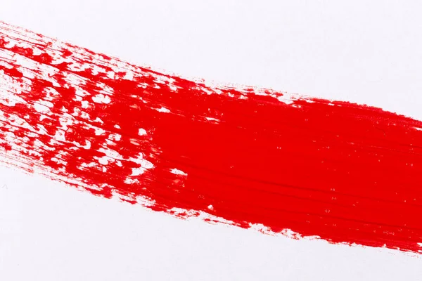 白い紙の上の赤いペンキのスプラッシュ — ストック写真