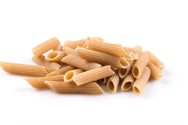 stock image Wholemeal Pasta Penne as close-up shot isolated on white background