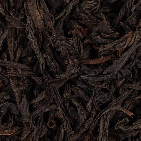 stock image Black dry tea leaves close up for background