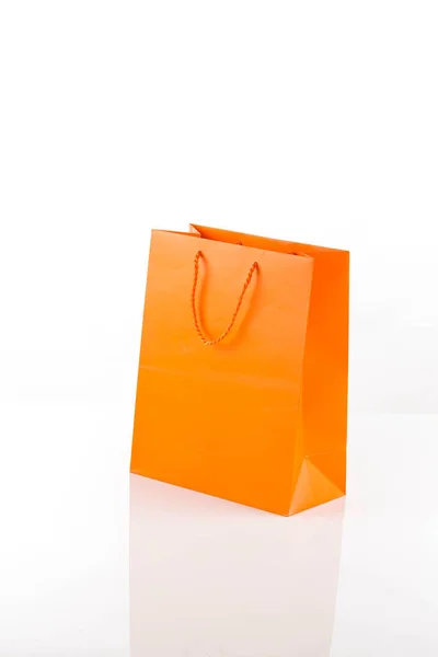 Orange Paper Shopping Bag Isolated White Diagonal Angle — Fotografia de Stock