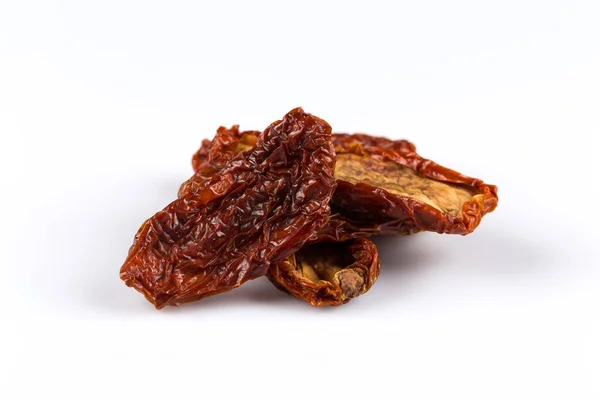 stock image dried tomatoes close up on white background