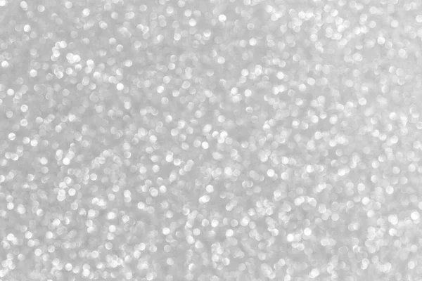 Silver glitter christmas abstract bokeh background. Blur bokeh background