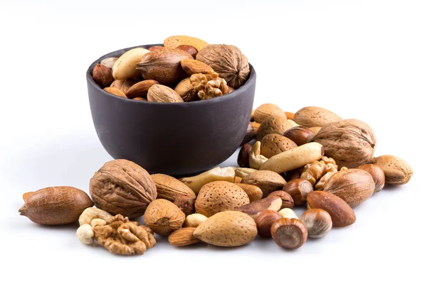 Large Diversity Healthy Nuts Dark Stone Bowl Isolated — Stock Photo, Image