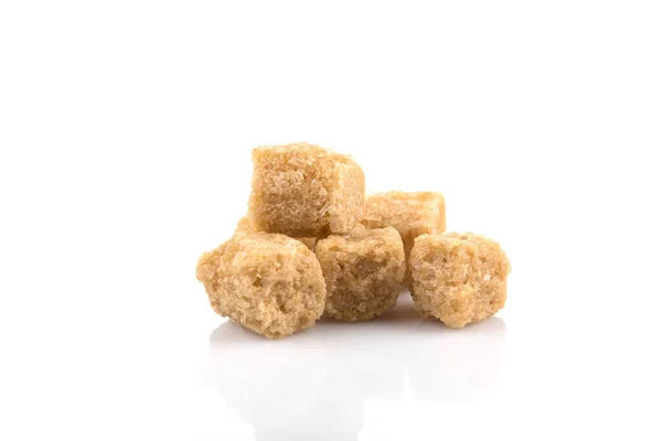 stock image Brown cane sugar cubes  on white background