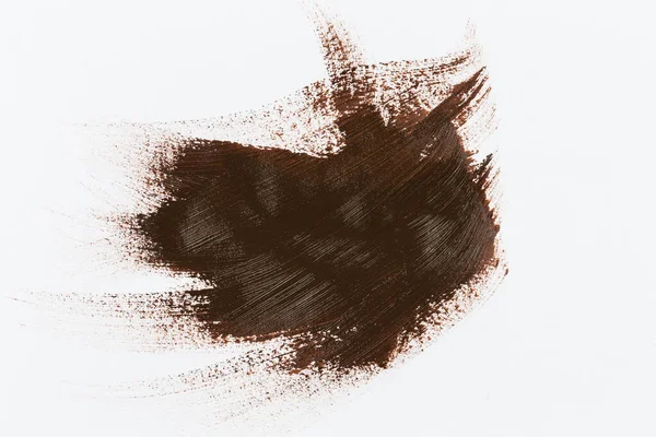白い紙のスケッチにペイントブラシの茶色のストローク — ストック写真