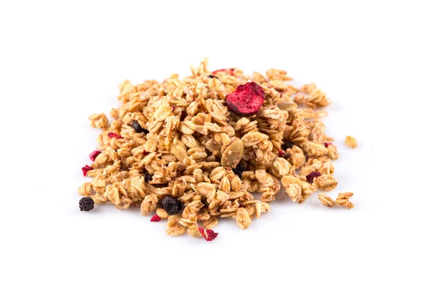 stock image Muesli cereals close up with  raisins, oat and wheat flakes, fruits, strawberry, cranberry, cherry pieces. Isolated on white