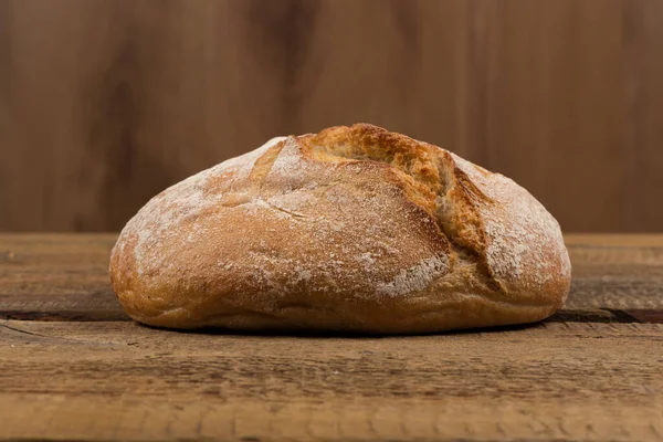 stock image Close up of white bread over wooden background