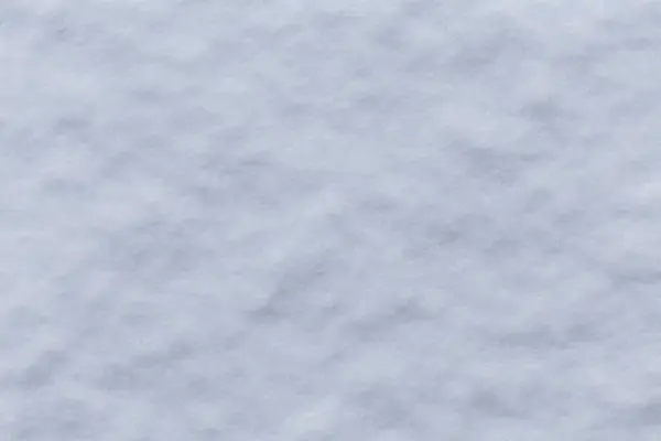 白い雪の結晶の背景雪のテクスチャの大まかなパターン — ストック写真