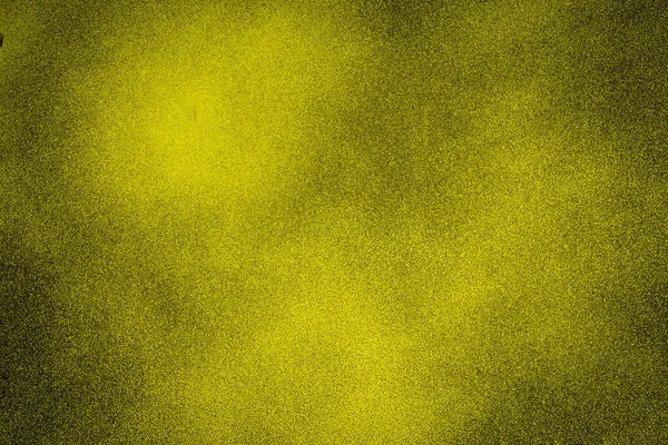 明るいセンター スポット ライトで暗い黄色のテクスチャ背景 — ストック写真