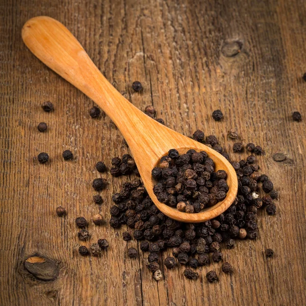 Black Pepper Wooden Spoon Wood Background — Stock Photo, Image
