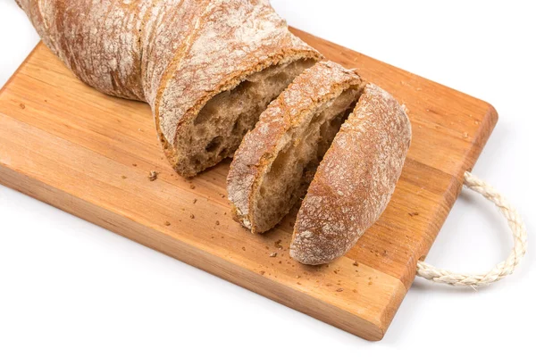 stock image sliced bread on cutting board on white background