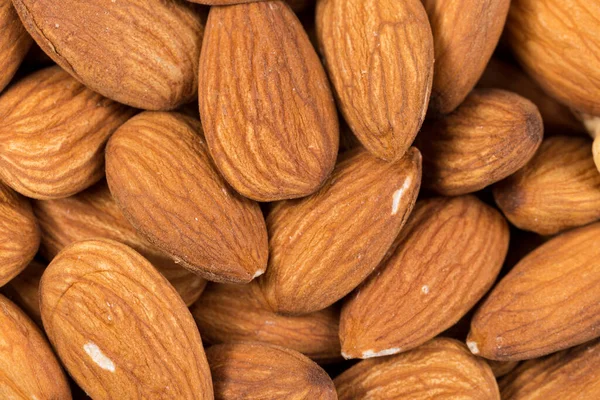 stock image Composition from almond nuts background - macro shot