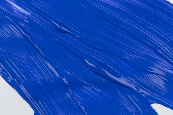 Stock image Blue stroke of the paint brush on white paper sketch