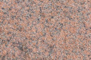 close-up de uma textura de granito vermelho marmorizado