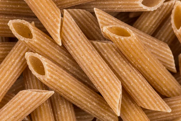 Wholemeal Pasta Penne Close Shot Background — Stock Photo, Image