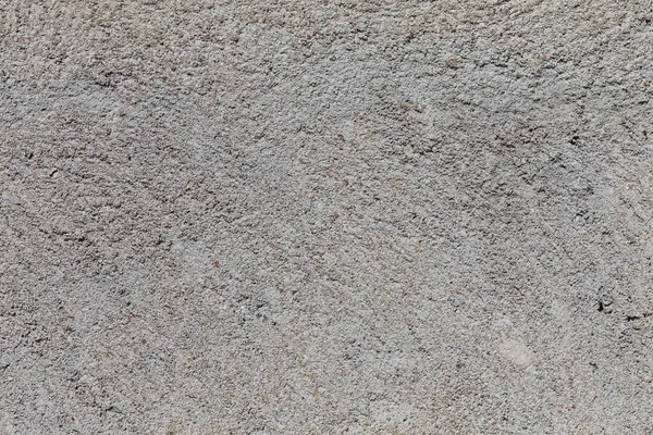 Crushed granite stones wall - close up background