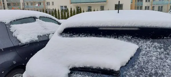 Car covered snow in the winter