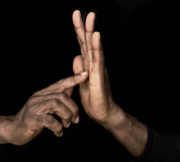 sign language with hand gestures  speaking body language with people on black background stock image stock photo