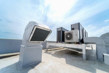 The air conditioning and ventilation system of a large industrial building is located on the roof. It consists of air ducts, air conditioning, smoke removal and ventilation clipart