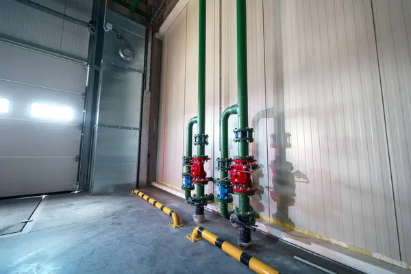Fire protection system for a warehouse with loading gates. Control and distribution point of the fire water supply system