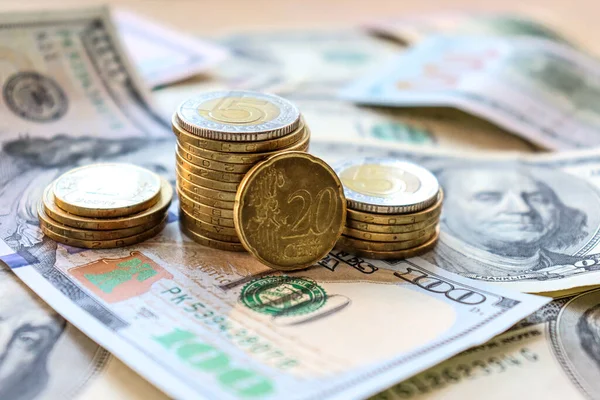 stock image Dollar bills laid out on the table. Three different columns of coins, 20 cents coin, financial crisis, money, finance, savings, salary, bank, euro cents. Photo, macro photography