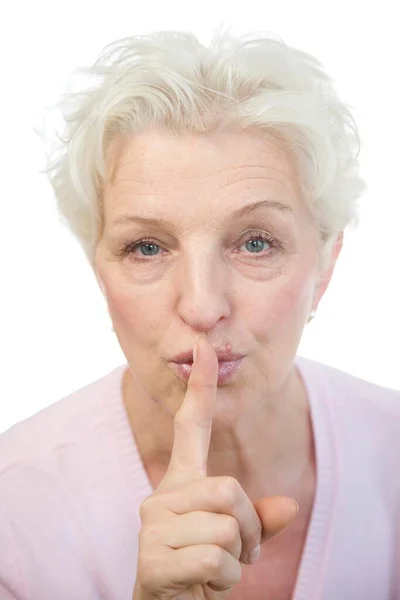Mulher Anos Segurando Dedo Nos Lábios — Fotografia de Stock