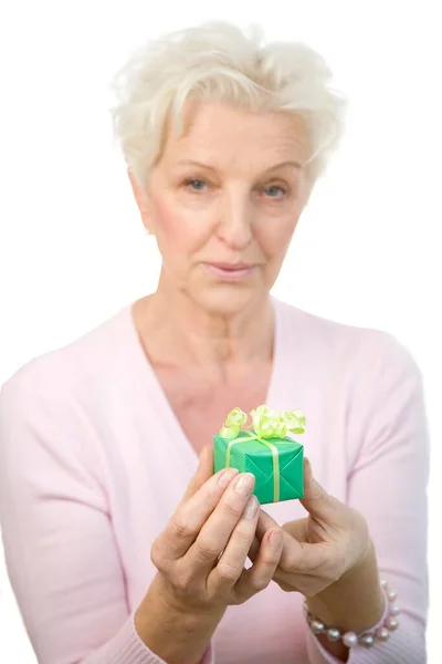 Old Woman Holding Present — Stock Photo, Image