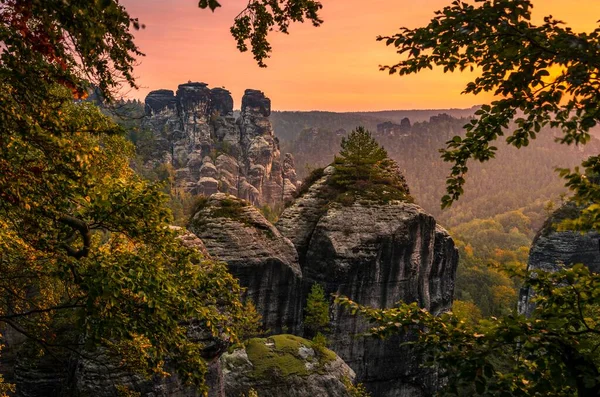 stock image Schrammsteine around the Bastei at sunrise, Elbe Sandstone Mountains, Rathen, National Park Saxon Switzerland, Saxony, Germany, Europe