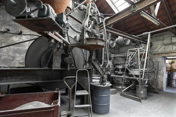 Production room with metal powder grinder, motion blur, in a metal powder mill, founded around 1900, Bavaria, Germany, Europe