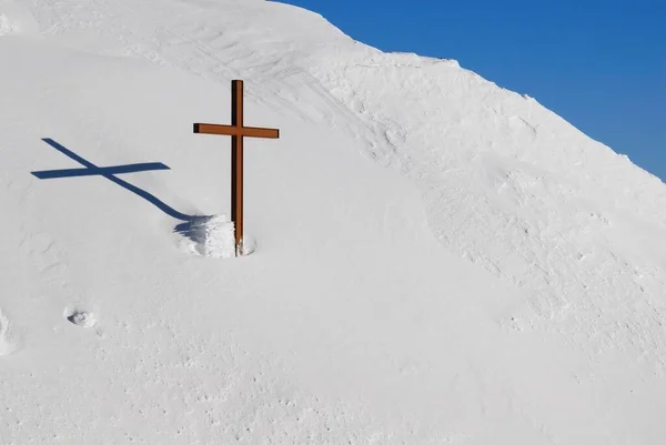 A cross on the top of Saentis - Switzerland, Europe.